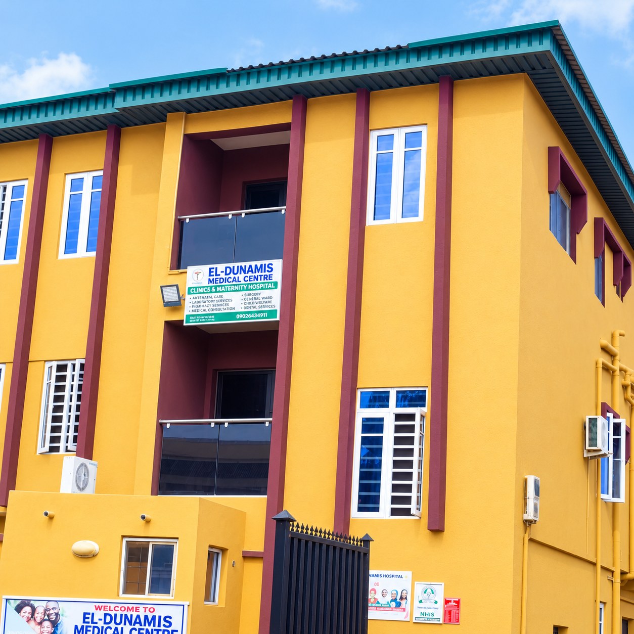 EL Dunamis Medical Centre building entrance, with signage reading Clinics & Maternity Hospital